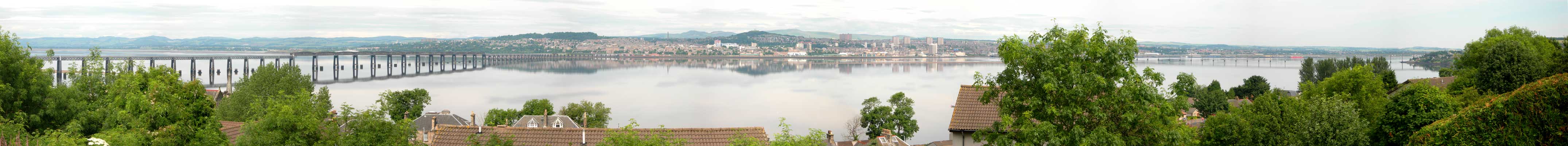 Wide expanse of the river Tay framed by two bridges